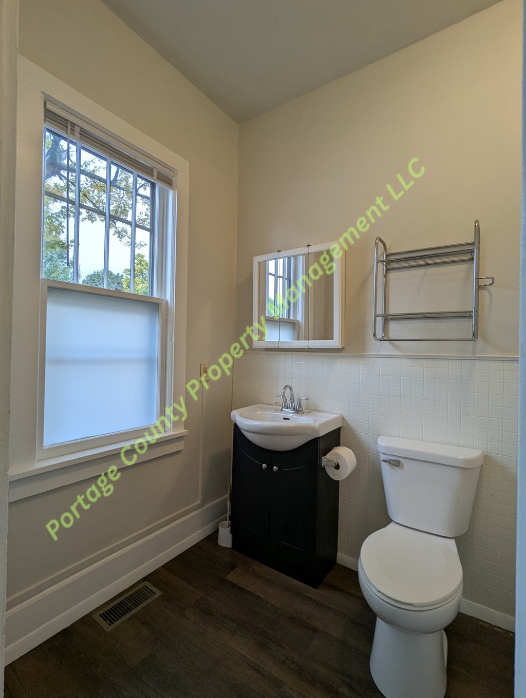 A bathroom with Portage County Prop Management LLC watermark.