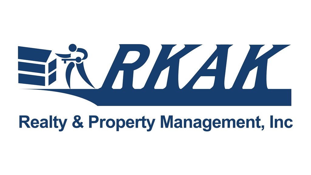 A logo for a realty and property management company.