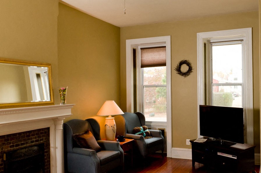a living room with a couch and a tv