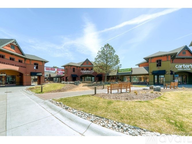 A sunny day at the Carter's storefront with a clear blue sky.