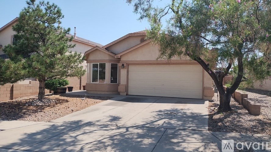 A house with a tree in front of it.