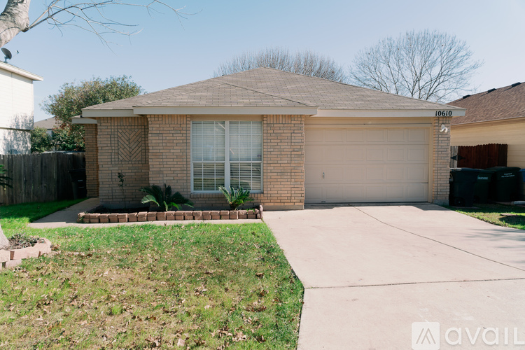 A house with a driveway and a garage door.
