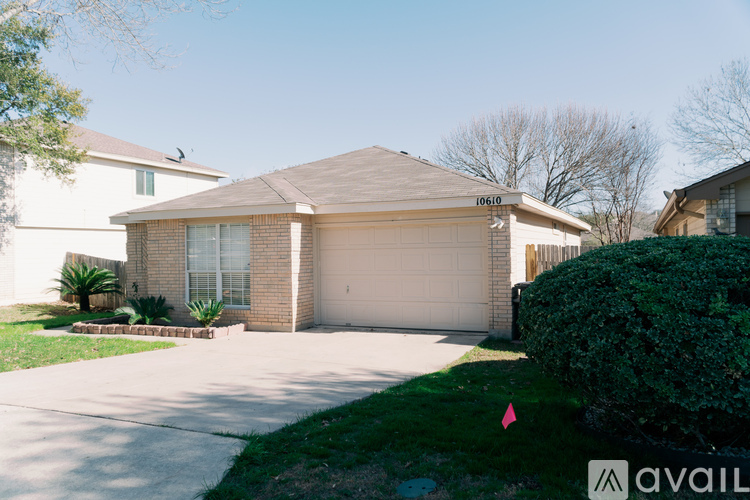 A house with the number 0610 on it is for sale.