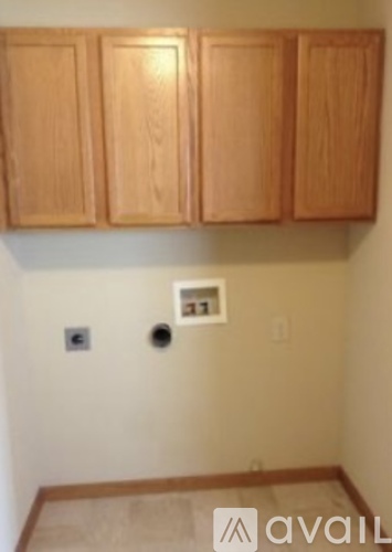 A wall with a switch and a socket.