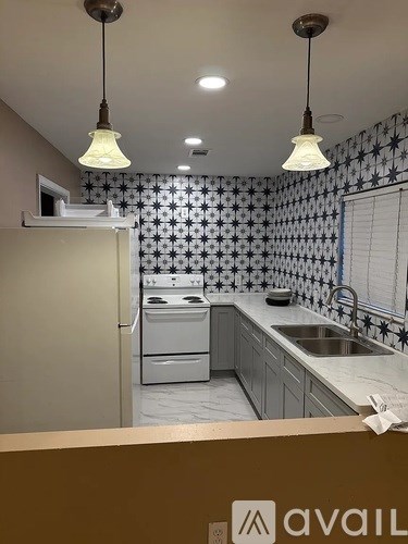 A kitchen with Avail sign on the counter.