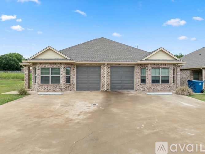A house numbered 1103 with a white door and a window.