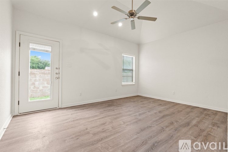 A kitchen with granite countertops and stainless steel appliances.