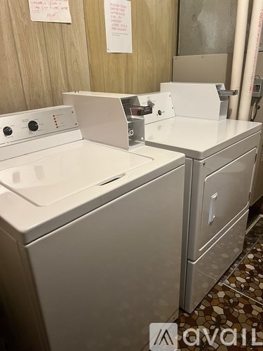 A white washing machine and dryer are available for rent.