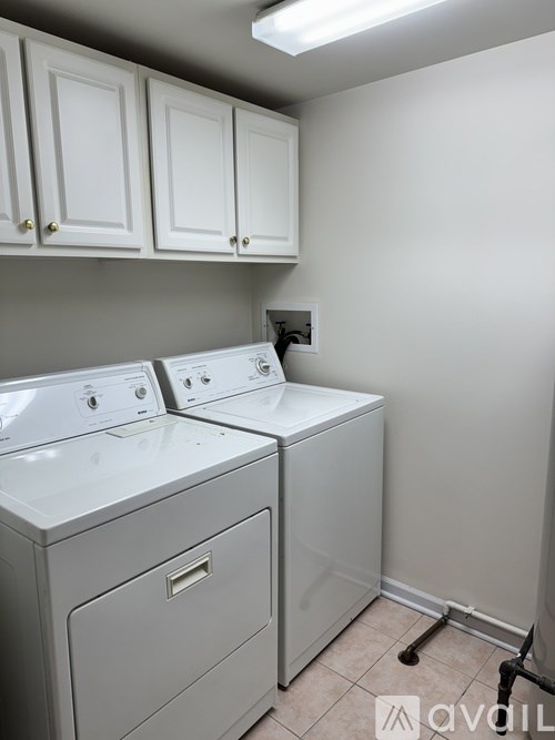 A laundry room with a washer and dryer.