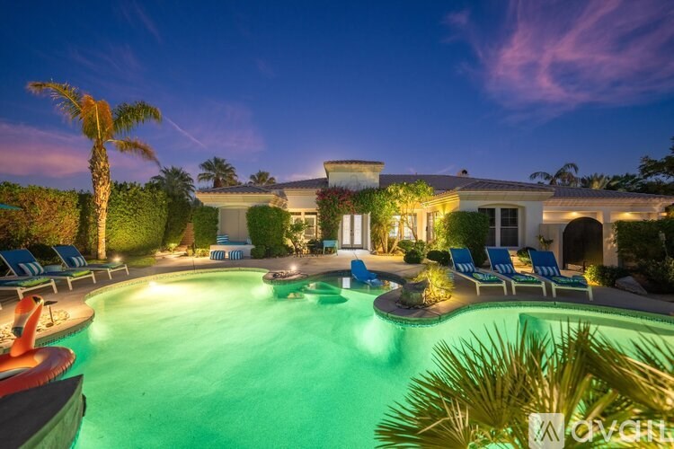 A house with a pool in the backyard.