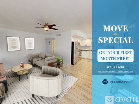 A living room with a couch, chair, and coffee table is on display for a move-in special.
