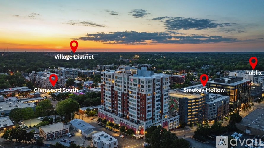 An aerial view of a city with three marked locations: Village District, Glenwood South, and Smokey Hollow.