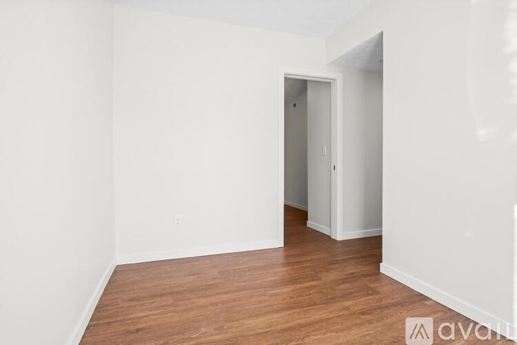 A two-story house with a garage on the side.