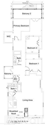 A white toilet and sink in a bathroom.