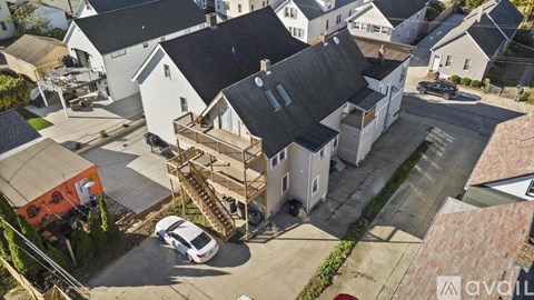 A bathroom with a sink, toilet, and bathtub.