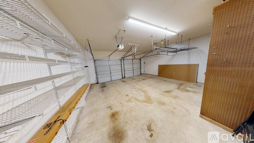 A bathroom with a stone wall and a white bathtub.