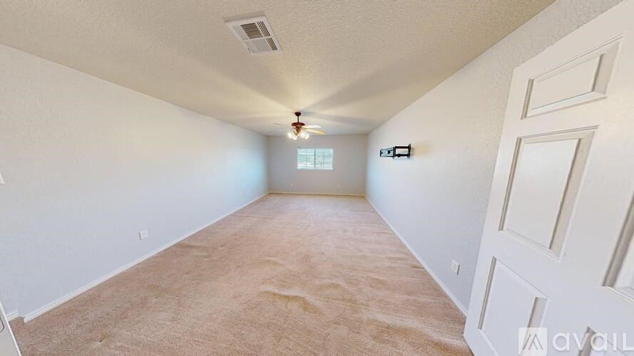 A house with a yard in front of it.