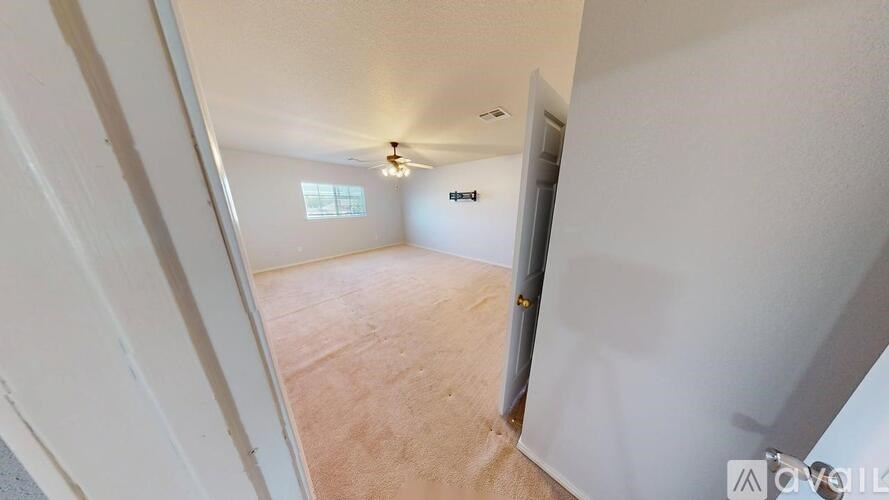 A house with a yard in front of it.