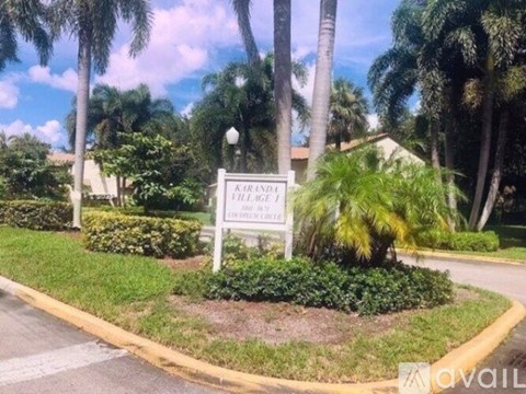 A sign in front of a building that says "Airport".