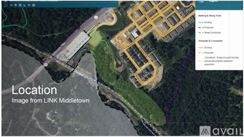 A satellite image of a location with a bridge and a construction site.