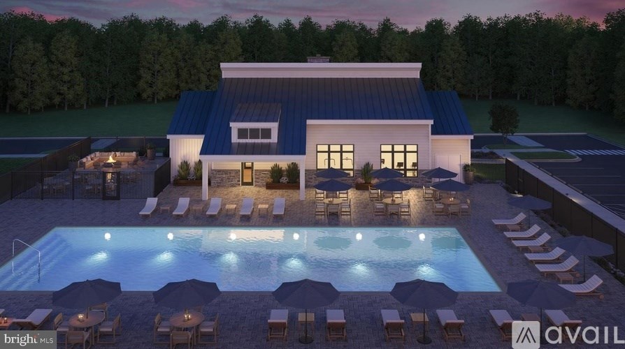 A modern house with a pool in the backyard.