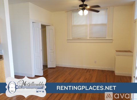 A flyer for a rental property with a phone number and website listed.