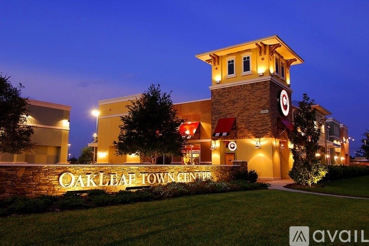 The Oak Leaf Town Center is lit up at night.