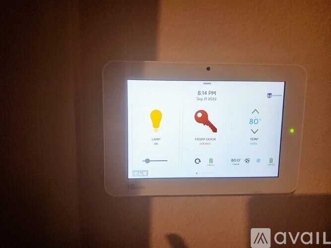 A digital display shows the time as 8:14 PM on September 21, 2023, with icons for light, front door, and temperature.