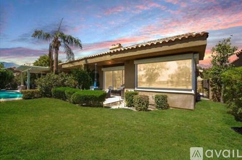 A house with a pool in the backyard is for sale.
