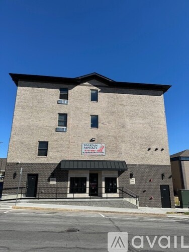 A building with a sign that says "SPANISH" on it.