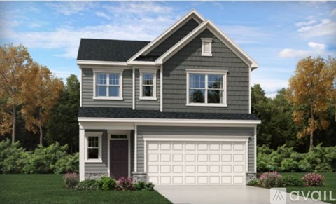 A two-story house with a garage is available for purchase.