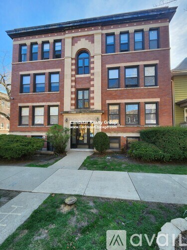 A building with the name "Thompson House Group" on it.