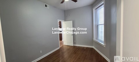 A room with a door and a window is available for rent.