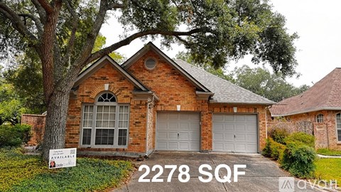 A house with the number 2278 SQF on the front yard.