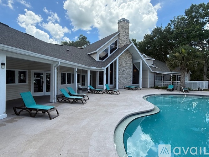 A house with a pool in the backyard.