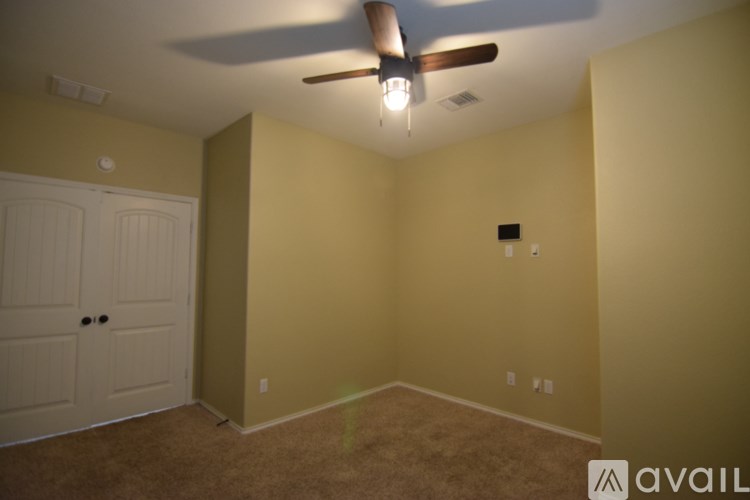 A bathroom with a toilet, sink, and bathtub.