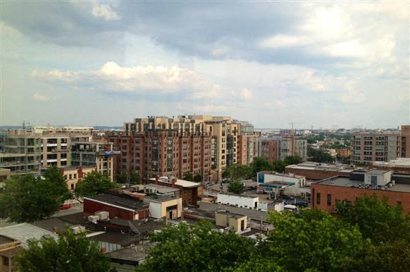 a view of a city from the roof of a building