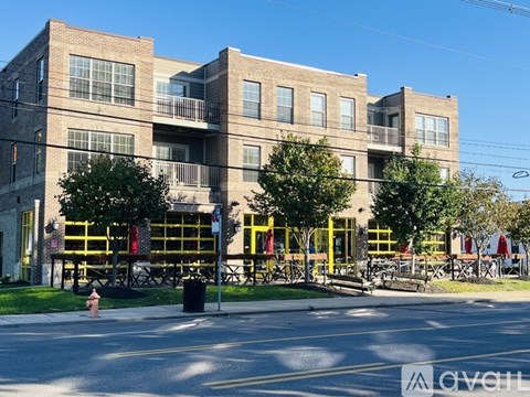A large building with a fire hydrant in front of it.