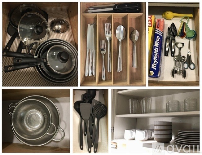 A collection of kitchen utensils and pans are displayed.