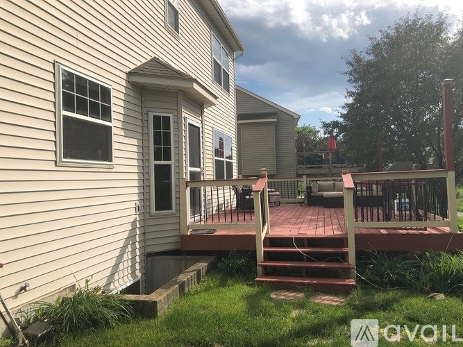 A house with a deck and a patio.