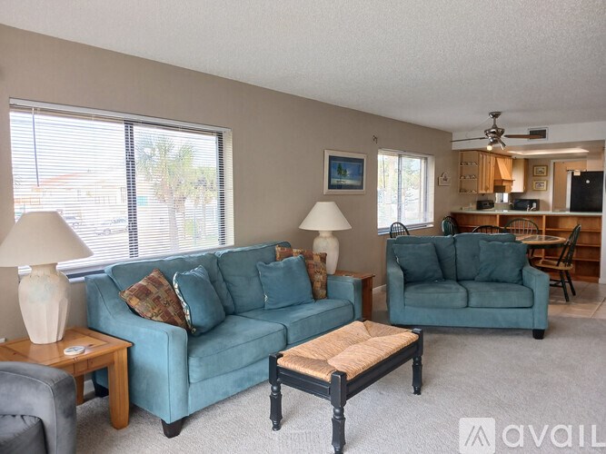 A living room with two couches and a coffee table.