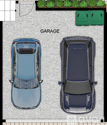 Two cars are parked in a garage.