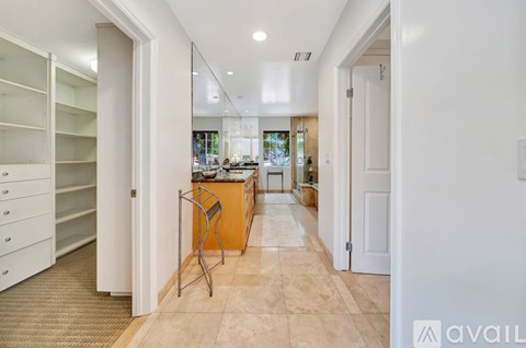 A spacious kitchen with a dining area and a bar.