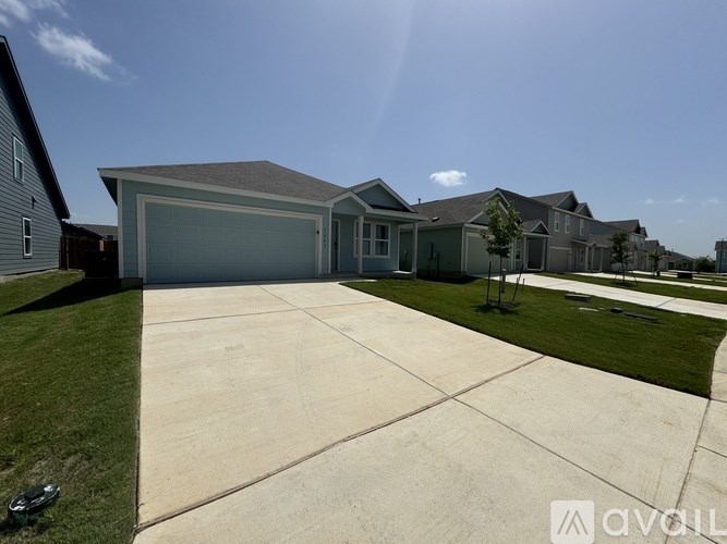 A house with a garage is shown in the image.