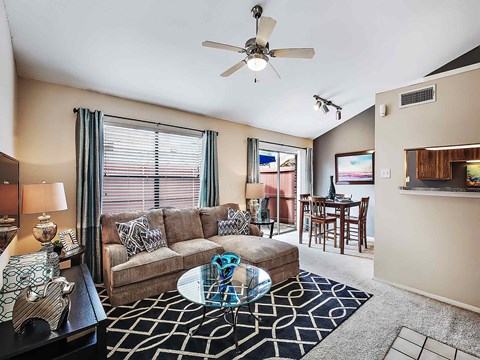 a living room with a couch and a coffee table