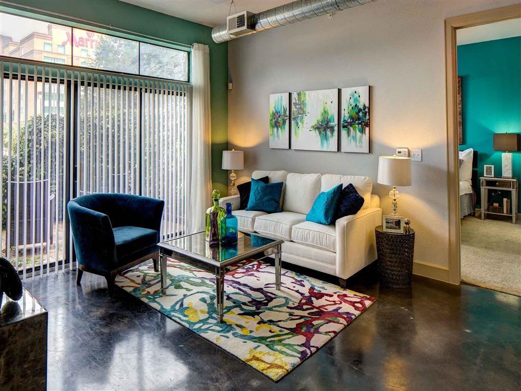 a living room with a couch and a table
