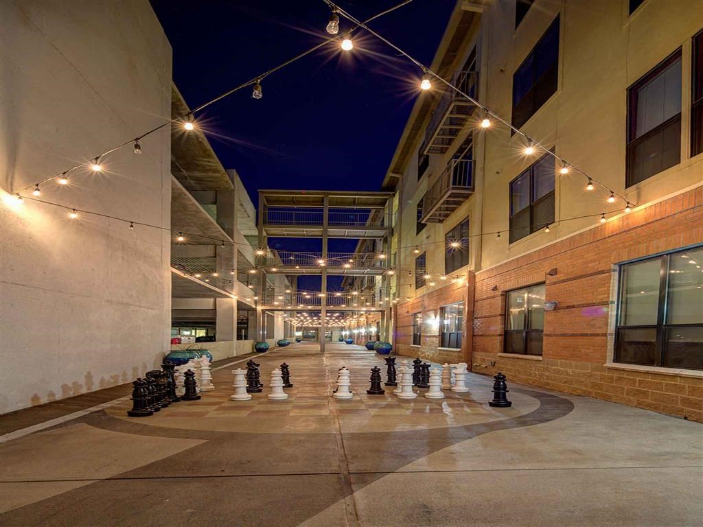 a game of chess in the middle of a courtyard