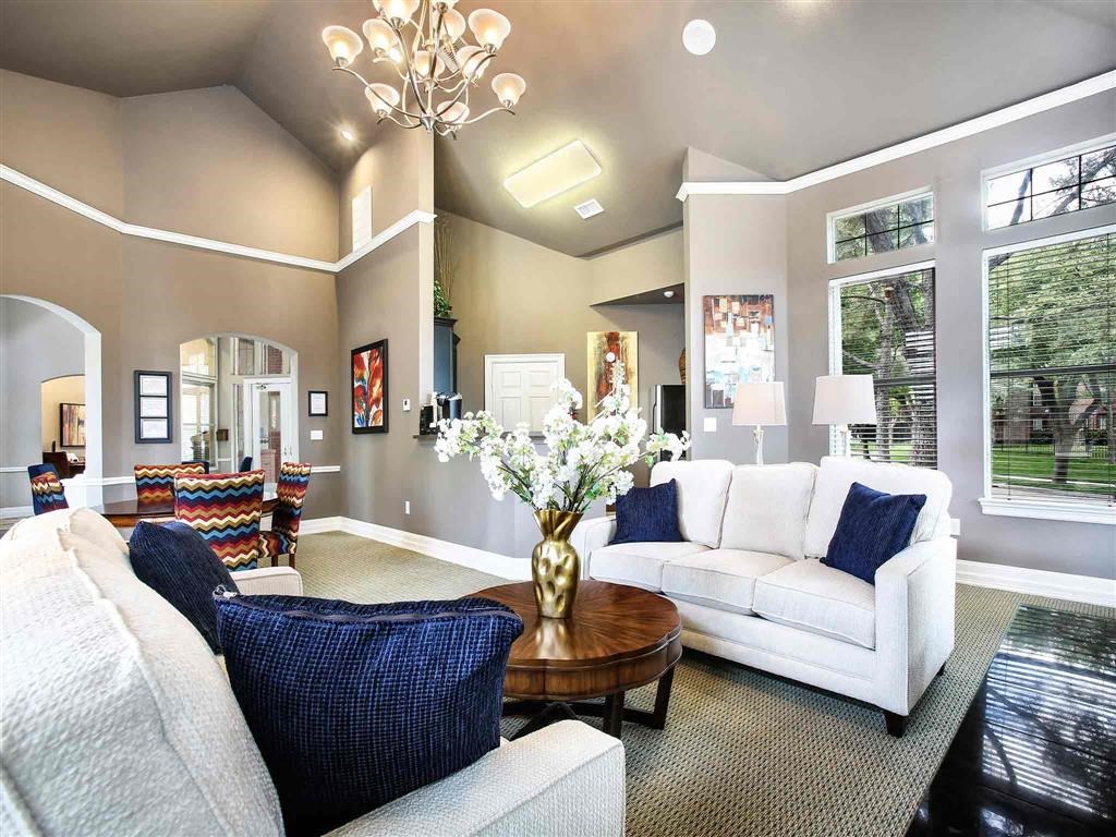 a living room with a couch and a table