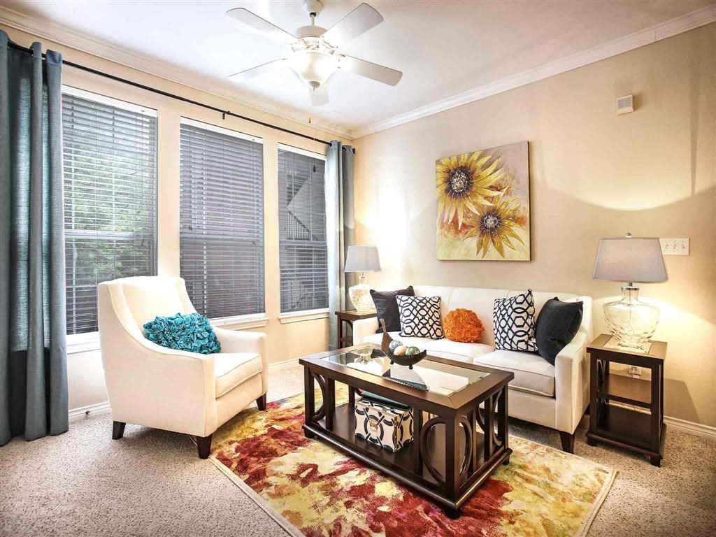 a living room with a couch and a coffee table