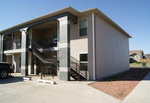 a house with a car parked in front of it